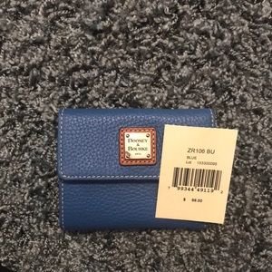 Blue Dooney wallet NEW. Tags detached never used.